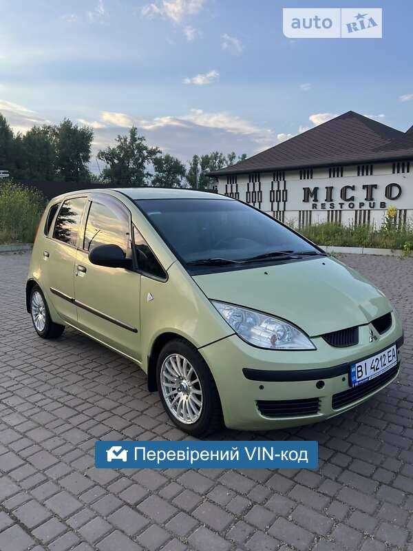 От чего подходит спойлер митсубиси кольт 5